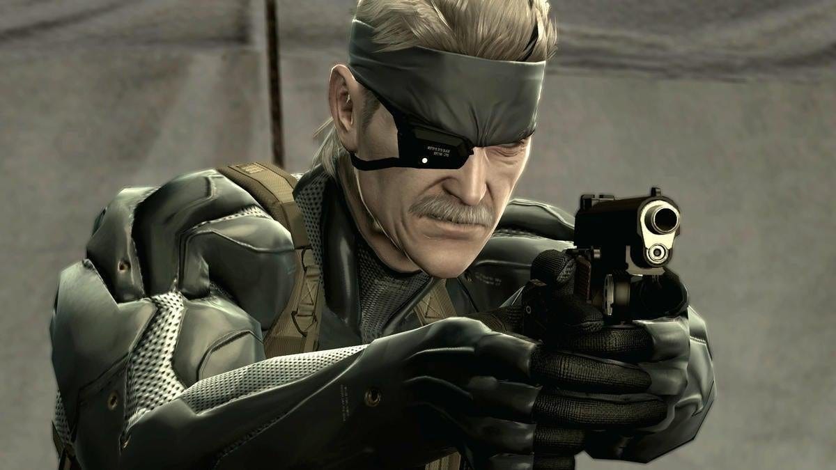 Metal Gear's Solid Snake in the 4th installment, with grey hair holding a gun.