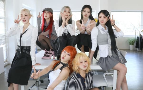 Group shot of Dreamcatcher during JUSTICE era in office clothes concept.